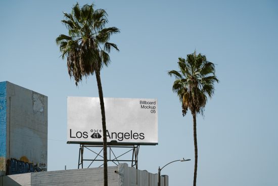 Billboard advertisement mockup with palm trees and clear sky showcasing urban outdoor advertising in Los Angeles, ideal for graphic design and templates.